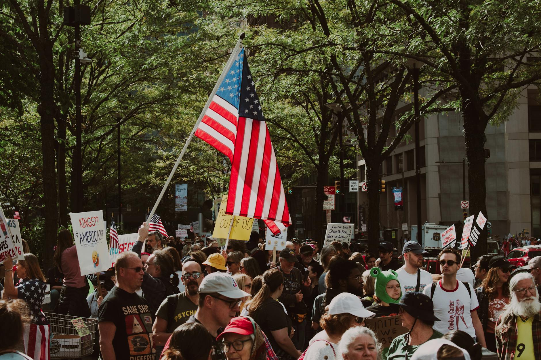 Crowd protesting with American flag